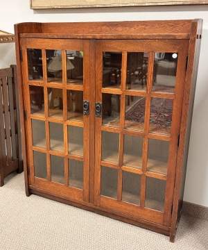 Gustav Stickley, A Twelve-Light Two-Door Oak Bookcase, Model No. 717