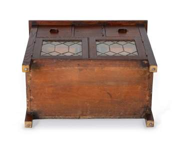 An Arts & Crafts Oak Side Cabinet with Leaded Glass Doors