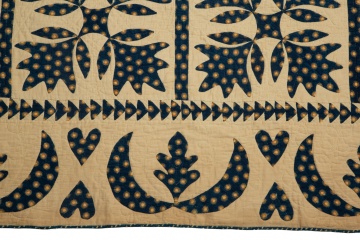 Blue and White Applique Quilt