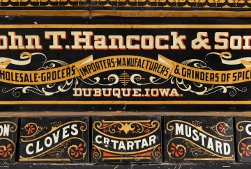John T. Hancock & Sons, Dubuque, Iowa, Painted and Stenciled Tin Seven-Compartment Country Store Spice Bin