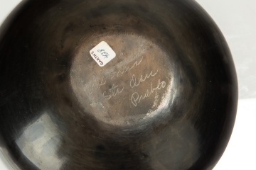 Pueblo Blackware Plate and a Carved Wood Bowl