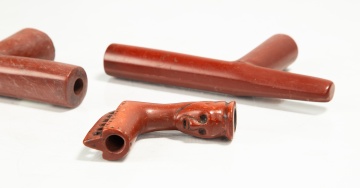 Three Native American Catlinite Pipe Bowls, One an Effigy