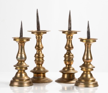 Four Continental Brass Pricket Candlesticks