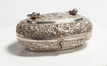 Pierced and Repousse Silver Oval Box with Swing Handle