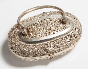 Pierced and Repousse Silver Oval Box with Swing Handle