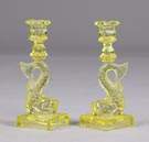 Pair Yellow Sandwich Glass Dolphin Candlesticks