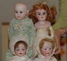 Group of 4 Dolls