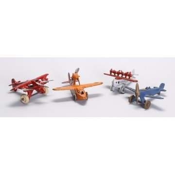 Group of 4 Cast Iron Airplanes