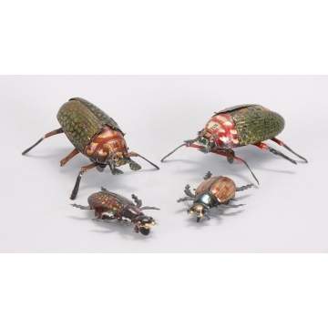 Group of 4 Lithographed Tin Scarabs