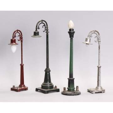 3 Lionel (unmarked) & 1 Dorfin Lamp Post
