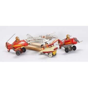 Group of 4 Lithographed Tin Wind-Up Airplanes