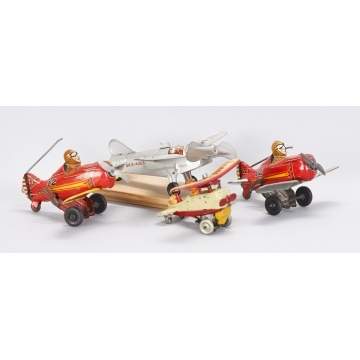 Group of 4 Lithographed Tin Wind-Up Airplanes