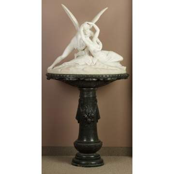A Large Carved Marble Group of Cupid and Psyche on Green Marble Pedestal