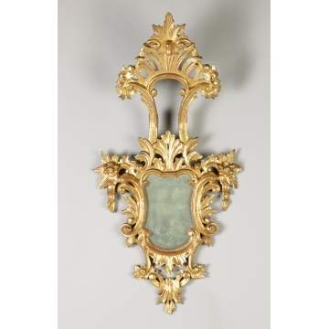 A Pair of Carved & Gilded Wall Mirrors