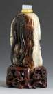 Relief Carved Nephrite Snuff Bottle