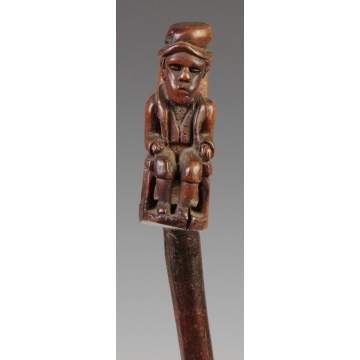 Carved Cane w/Seated Gentleman, Coat & Hat 