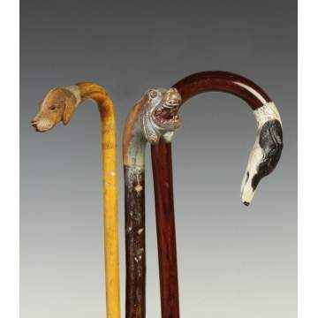 Three Canes with Carved Dog Handles