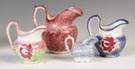 Four Spatterware Decorated Pitchers