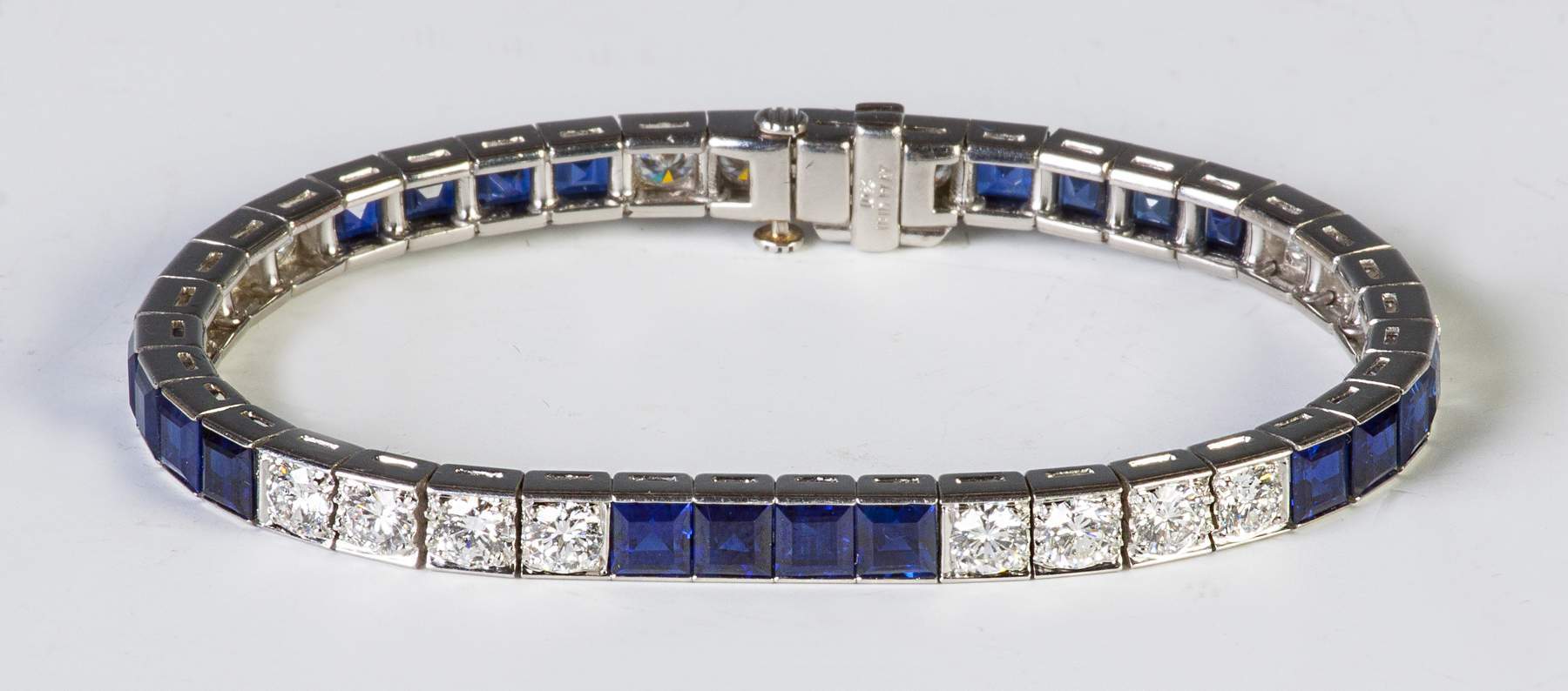 Platinum, Diamond & Sapphire Bracelet | Cottone Auctions