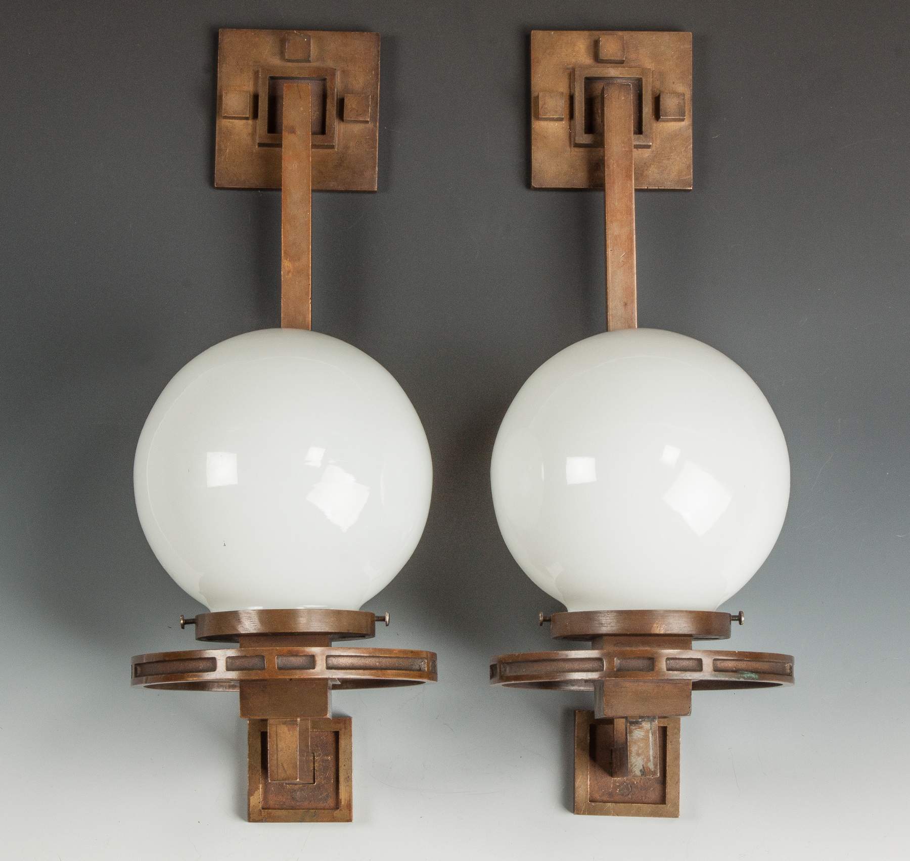 Frank Lloyd Wright (American, 18671959) Pair of Rare Wall Sconces